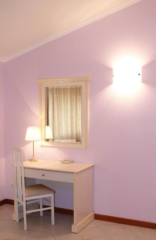Aparthotel Il Nido Della Rondine Lucca Pokoj fotografie